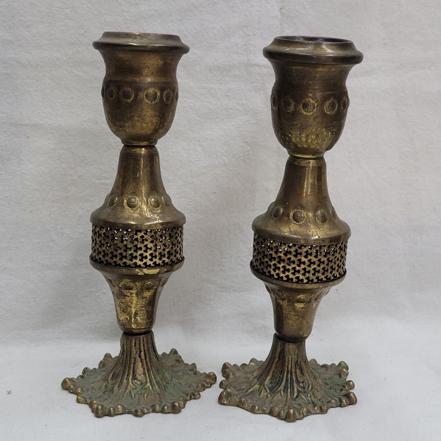 Handmade Vintage brass Sabbath candlesticks cut out design in magnificent condition. Made in Israel early 20th century, diameter 8 cm X 18.8 cm.