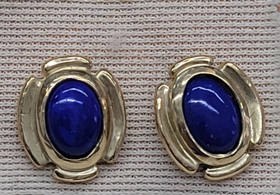 Handmade 14 carat gold stud earrings Lapis Lazuli stones set with oval cabochon Lapis Lazuli stones. Dimension 0.7 cm X 0.5 cm approximately.