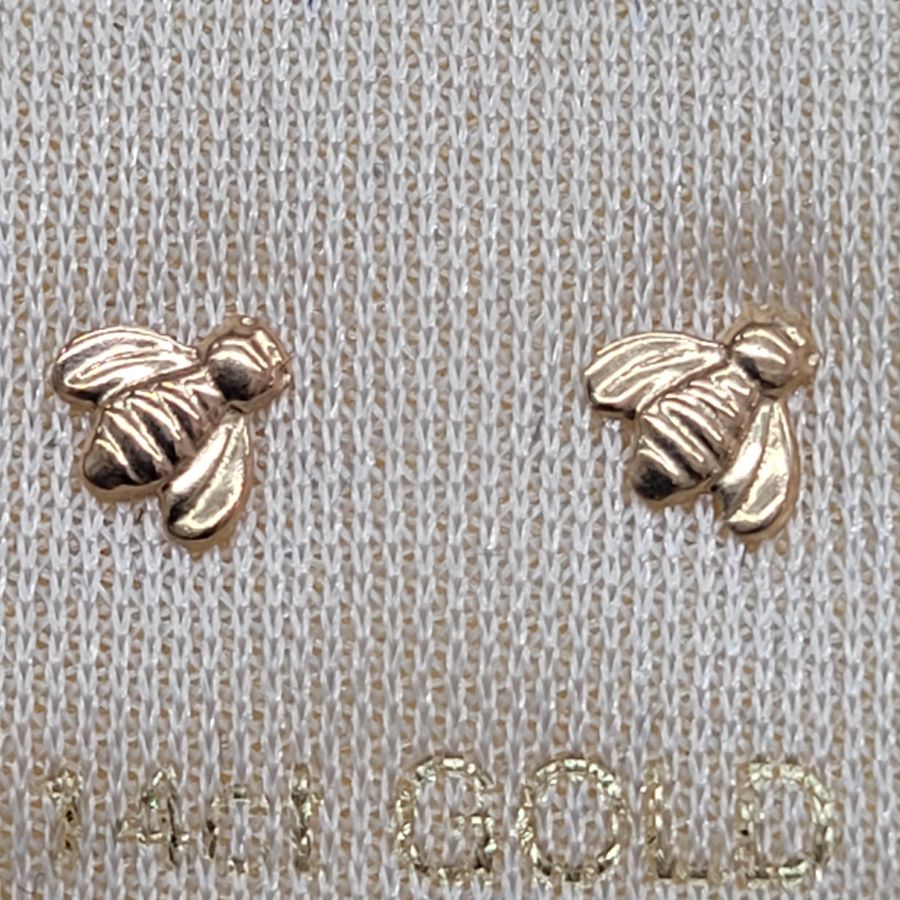 Handmade 14 carat gold bee shape stud earrings shiny and smooth design, suitable for young girls. Dimension 0.5 cm X 0.5 cm approximately.