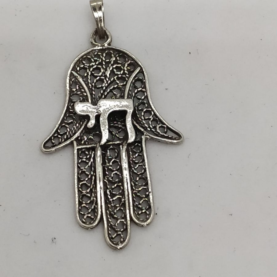 Handmade sterling silver Hamsa Chamsa pendant filigree Hay and fine Yemenite filigree design. Dimension 2.5 cm X 4.2 cm X 0.1 cm approximately.