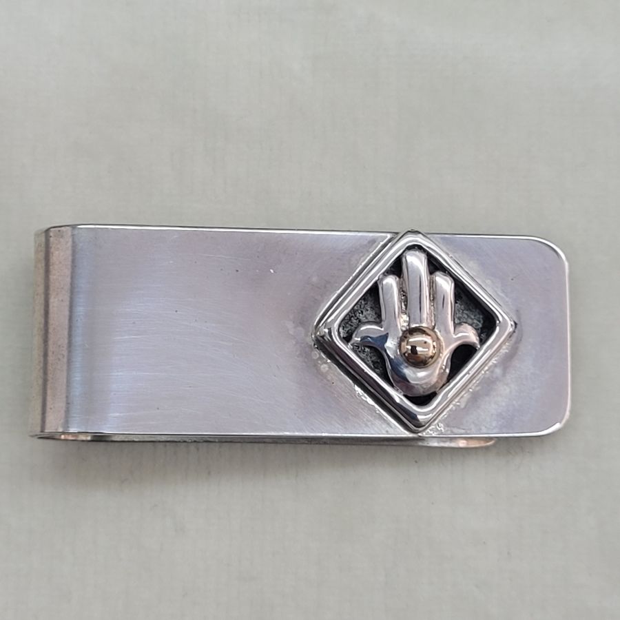 Handmade sterling silver Hamsa money holder in a square frame and a gold dot on top of Hamsa. Handmade by S. Ghatan. Katan.