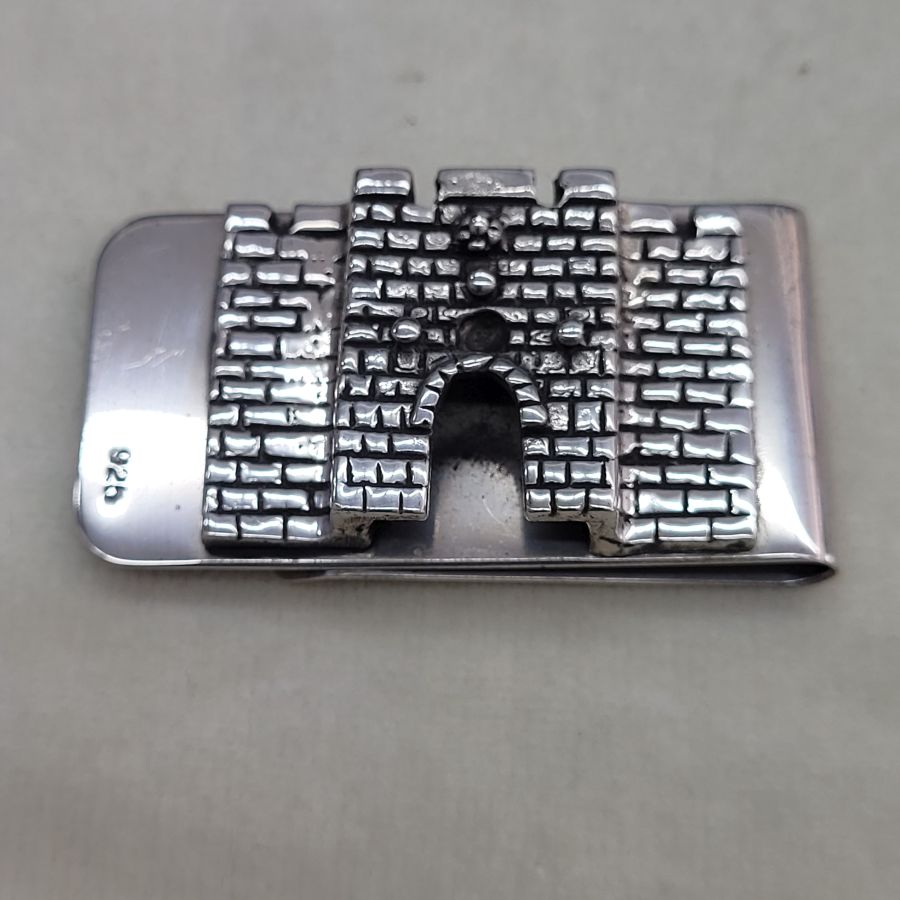 Handmade sterling silver Lion's gate money holder shape encrusted solid made by Biers. Dimension 2.5 cm X 5 cm approximately.