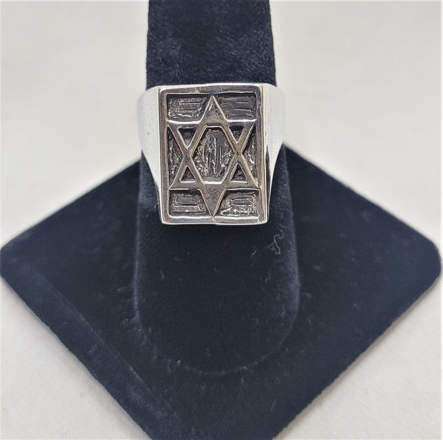 Handmade sterling silver ring Magen David shape suitable for man finger. Dimension 1.3 cm X 1.8 cm approximately. European finger size 58, USA size 8.5.