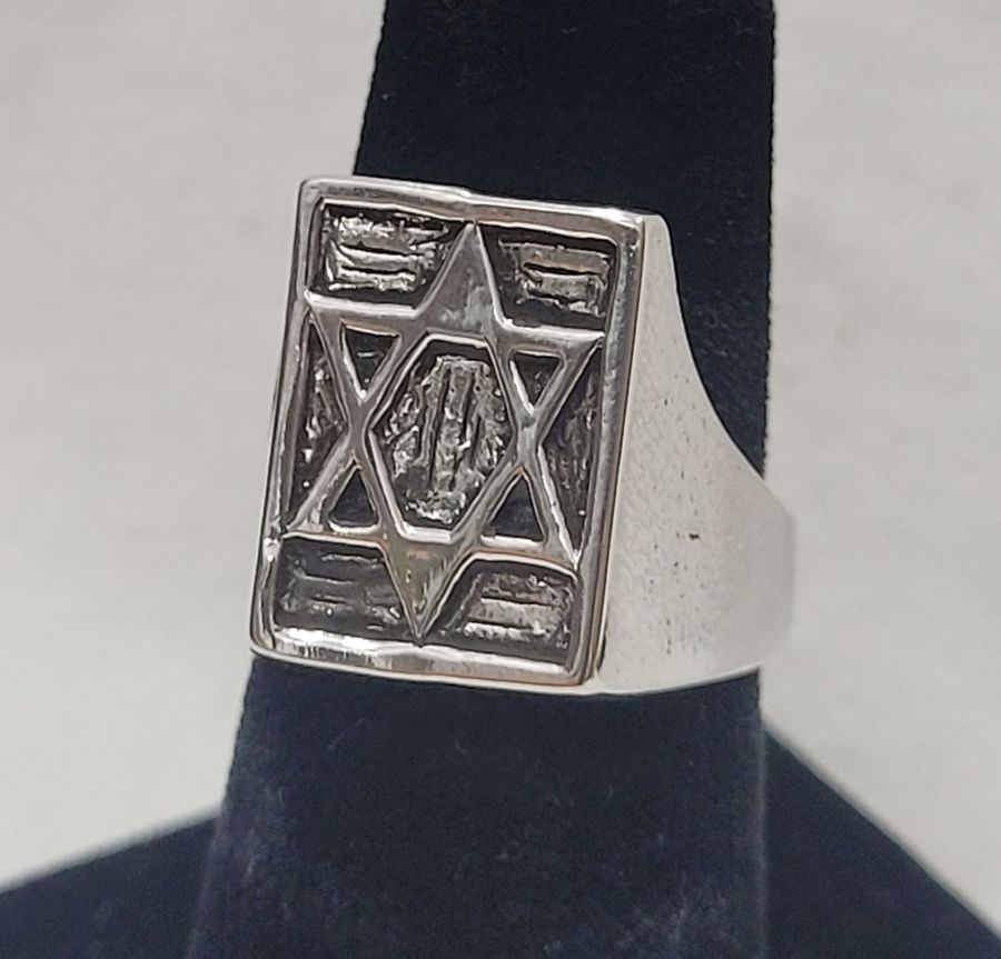 Handmade sterling silver ring Magen David shape suitable for man finger. Dimension 1.3 cm X 1.8 cm approximately. European finger size 58, USA size 8.5.