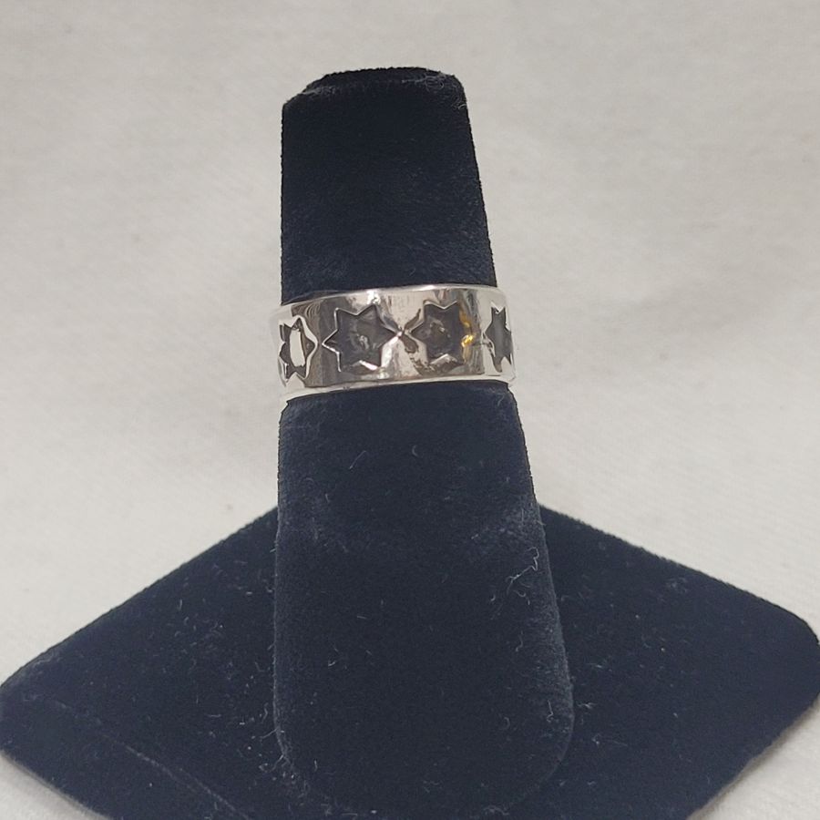 Handmade sterling silver David stars band ring with many stars adjustable suitable for any finger size . Dimension 0.7 cm approximately.