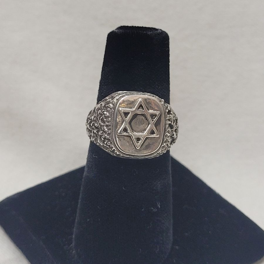 Handmade sterling silver ring Magen David star rough masculine design suitable for man finger. Dimension 1 cm X 1.5 cm approximately.