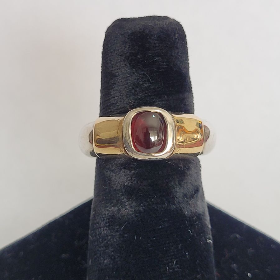 Handmade sterling silver & 14 carat yellow gold silver cabochon ring contemporary style ring set with cabochon cut Garnet stone.