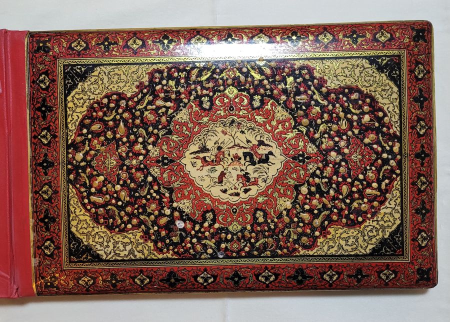 Vintage Middle East album hand painted in the middle east early 20th century. On each page there is a romantic drawing of lovers.