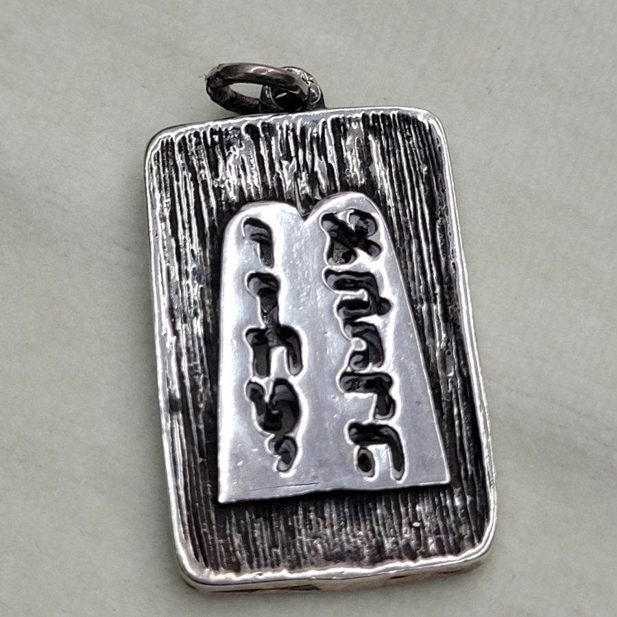 Sterling silver ten commandments pendant cutout handmade. I can make it in 14 carat gold by request. Dimension 1.9 cm X 2.9 cm X 1.2 cm approximately.