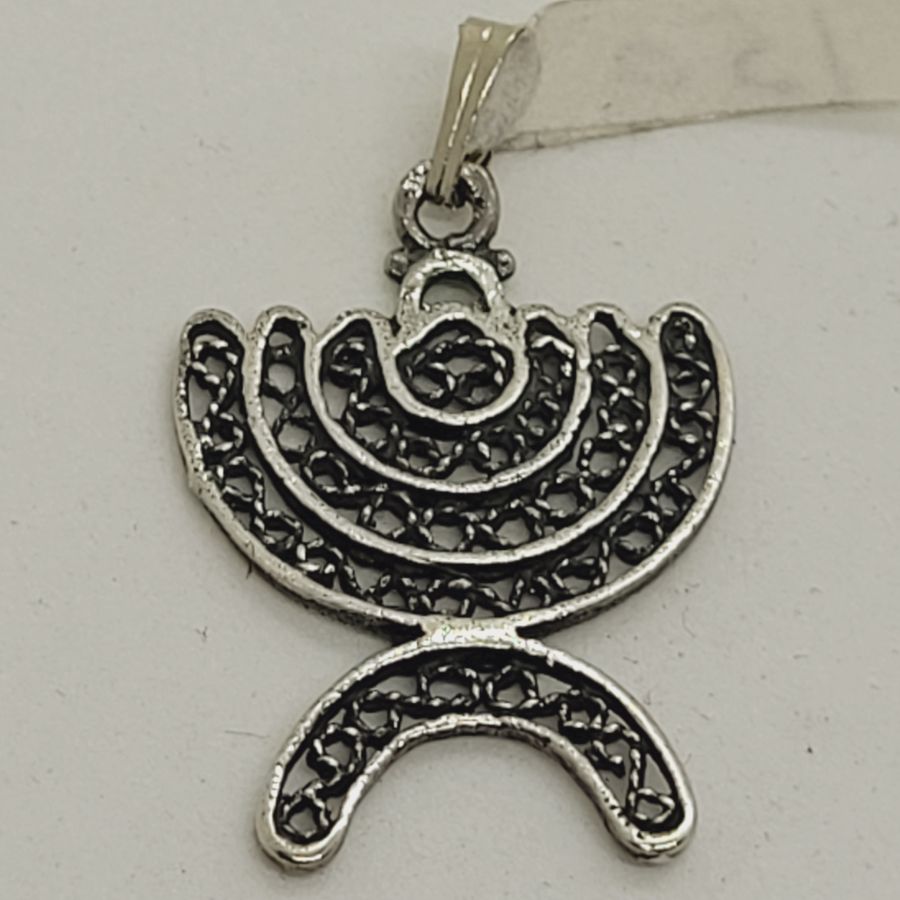 Handmade sterling silver Menorah pendant Yemenite Filigree, with round curved branches. Dimension 3.2 cm X 2 cm approximately.