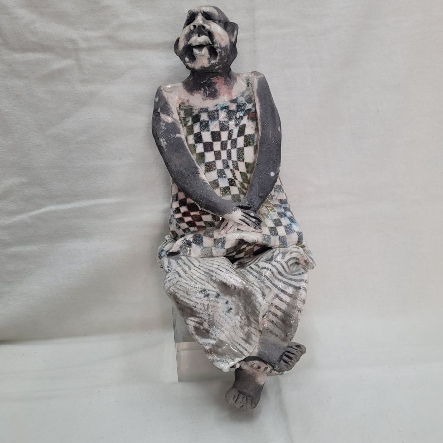 Handmade glazed ceramic Harlequin Roku ceramic statue sitting made by S. Factor. It is supposed to sit on a shelf side 29.5 cm X 10 cm X 12 cm.