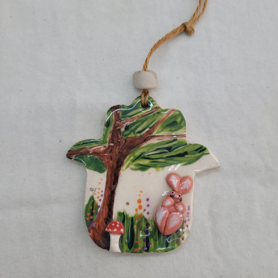 Ceramic Hamsa pink bunny glazed wall hanging handmade by Raheli with blue horse. Hamsa is considered in this era as an amulet to protect from the evil eye.