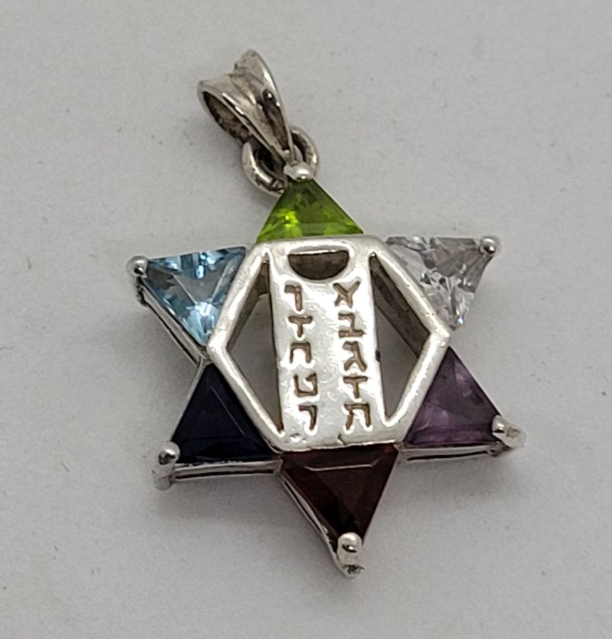 A classic shape sterling silver Magen David star pendant colored David star triangle Zircon stones to fill the star angles and the ten commandments tablets.