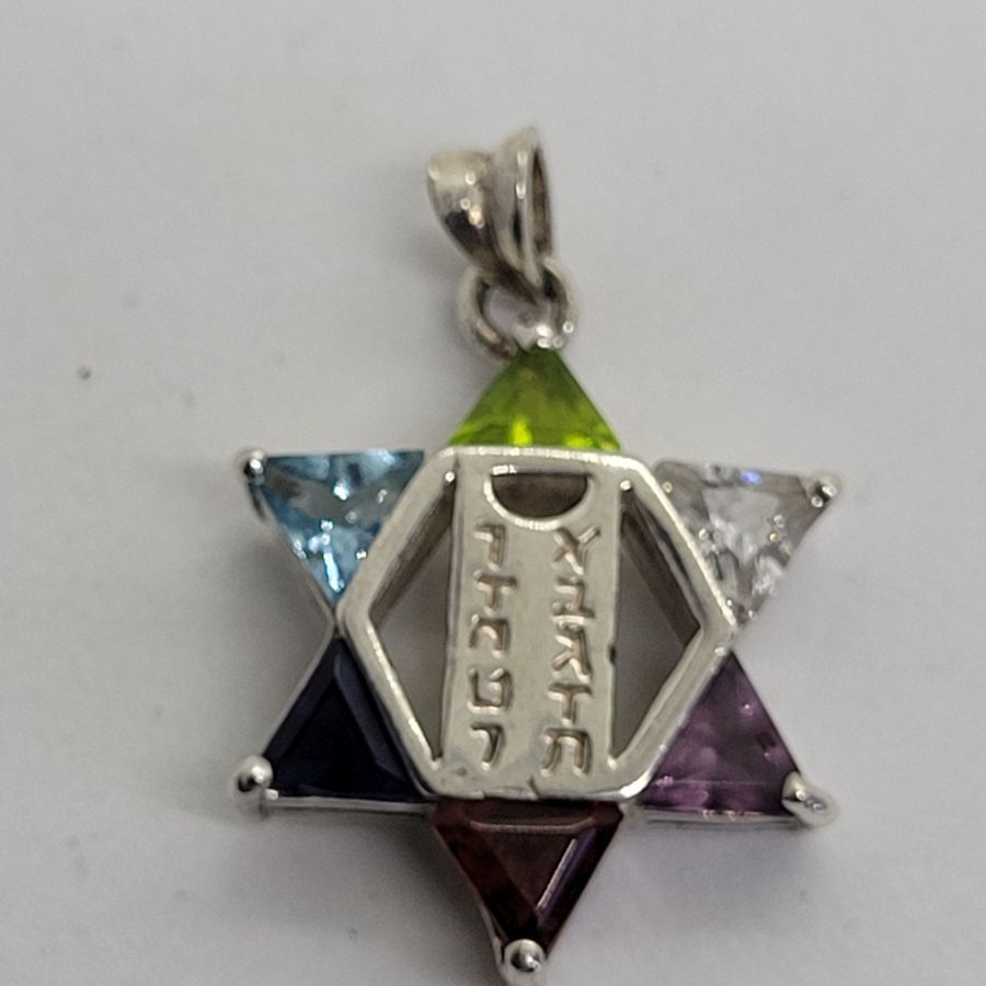 A classic shape sterling silver Magen David star pendant colored David star triangle Zircon stones to fill the star angles and the ten commandments tablets.