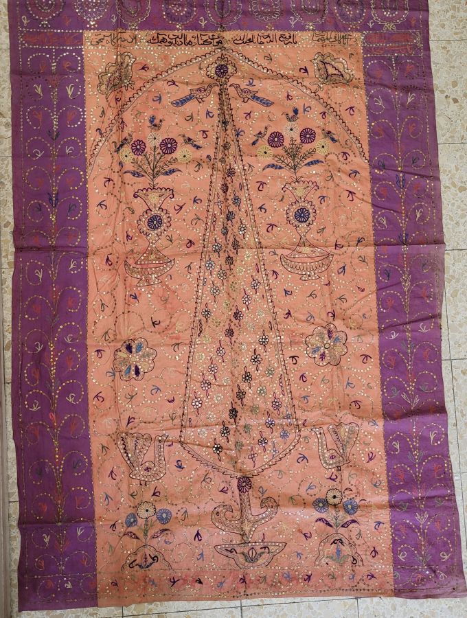 Handmade rectangle cotton Suzani vintage original unusual décor with pine tree, flowers and birds and ornate with small disks on the design.