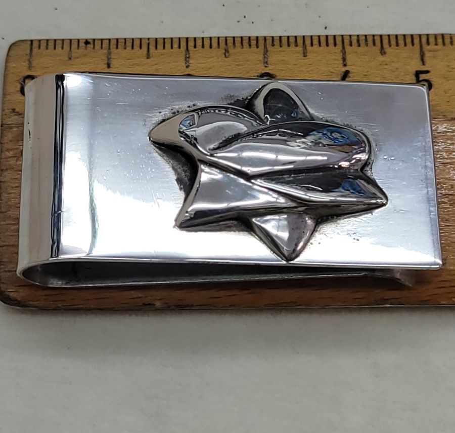 Handmade sterling silver abstract MagenDavid money holder, David star shaped as a dove made by S. Ghatan Katan. Dimension 2.4 cm X 5 cm approximately.