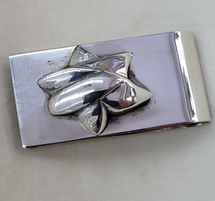 Handmade sterling silver abstract MagenDavid money holder, David star shaped as a dove made by S. Ghatan Katan. Dimension 2.4 cm X 5 cm approximately.