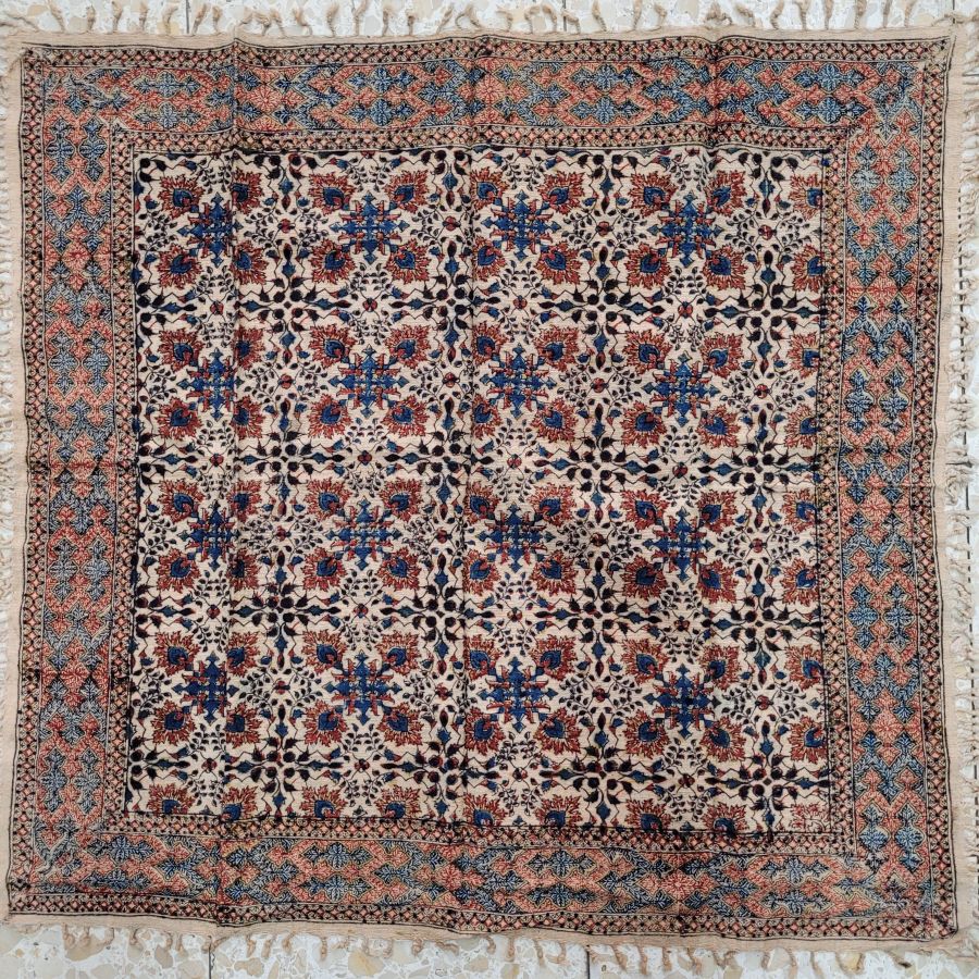 Handmade square Qalamkari cotton tablecloth, where are beautiful because of the different flowers and geometrics skillfully used.