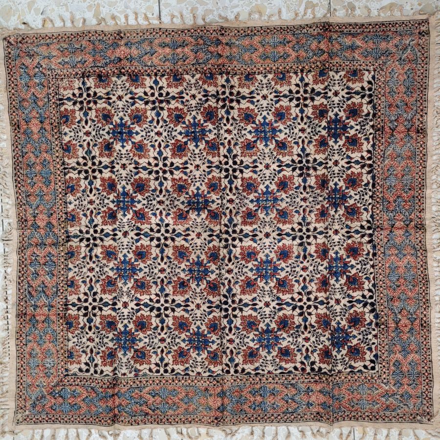Handmade square Qalamkari cotton tablecloth, where are beautiful because of the different flowers and geometrics skillfully used.