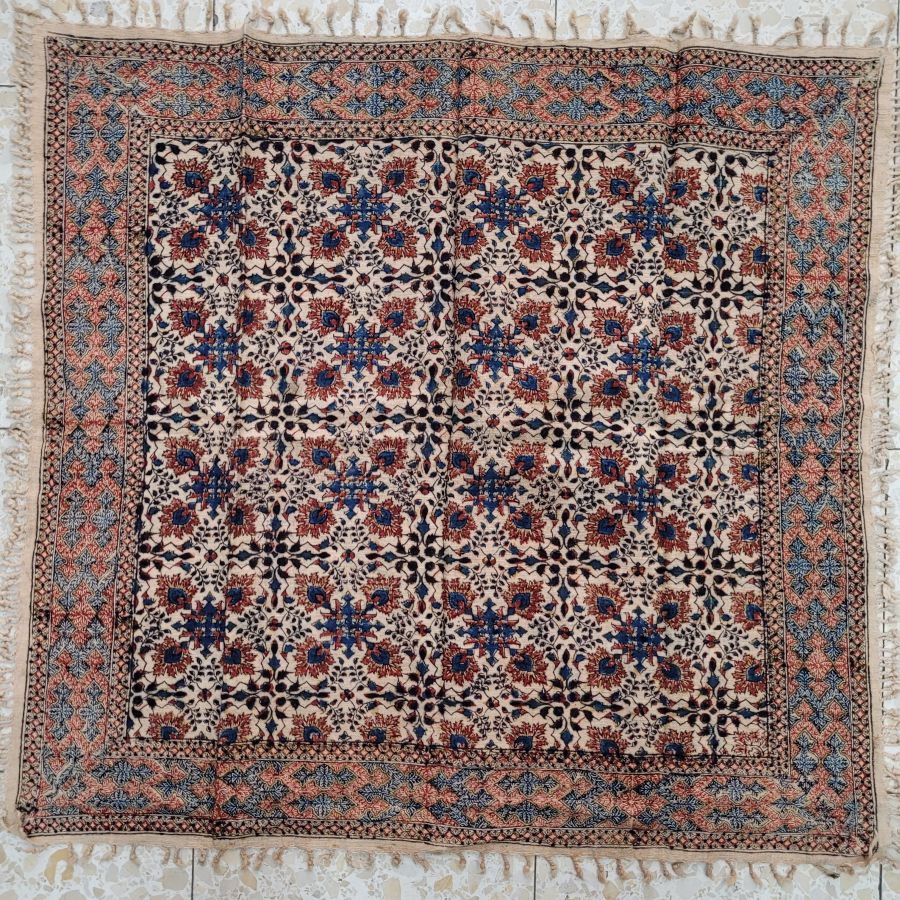 Handmade square Qalamkari four flower pattern cotton tablecloth, where are beautiful designs because of the different flowers and geometrics.