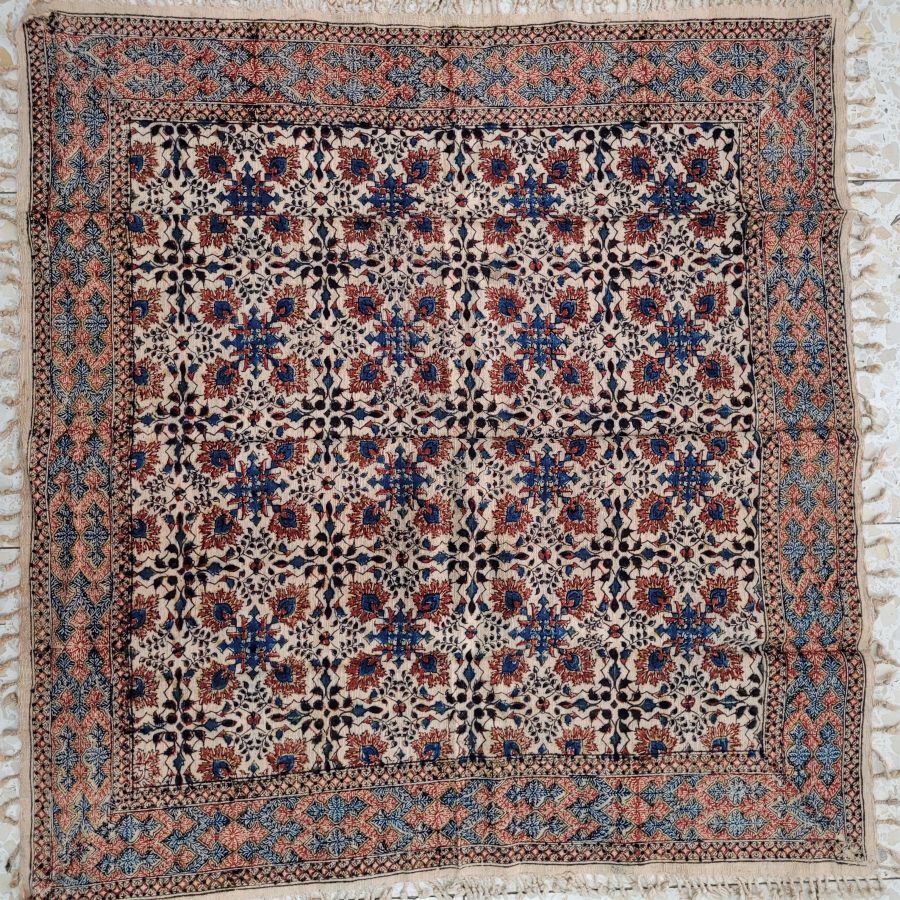 Handmade square Qalamkari four flower pattern cotton tablecloth, where are beautiful designs because of the different flowers and geometrics.