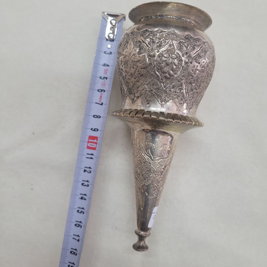 The engravings on vintage brass and copper silver plated Purim ratchet are handmade & hammered showing floral and geometric designs.