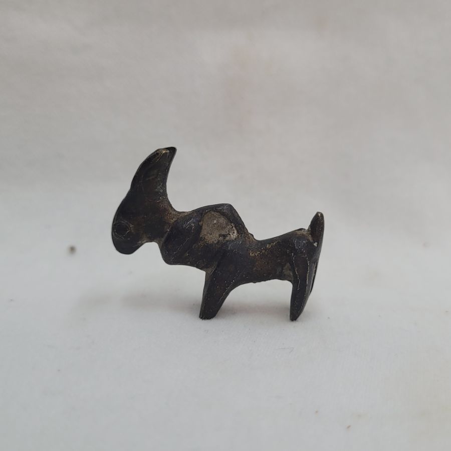 Genuine bronze donkey idol antique small found in the holy land and dated 2000 BC. Dimension 2.8 cm X 2.2 cm X 0.6 cm approximately.