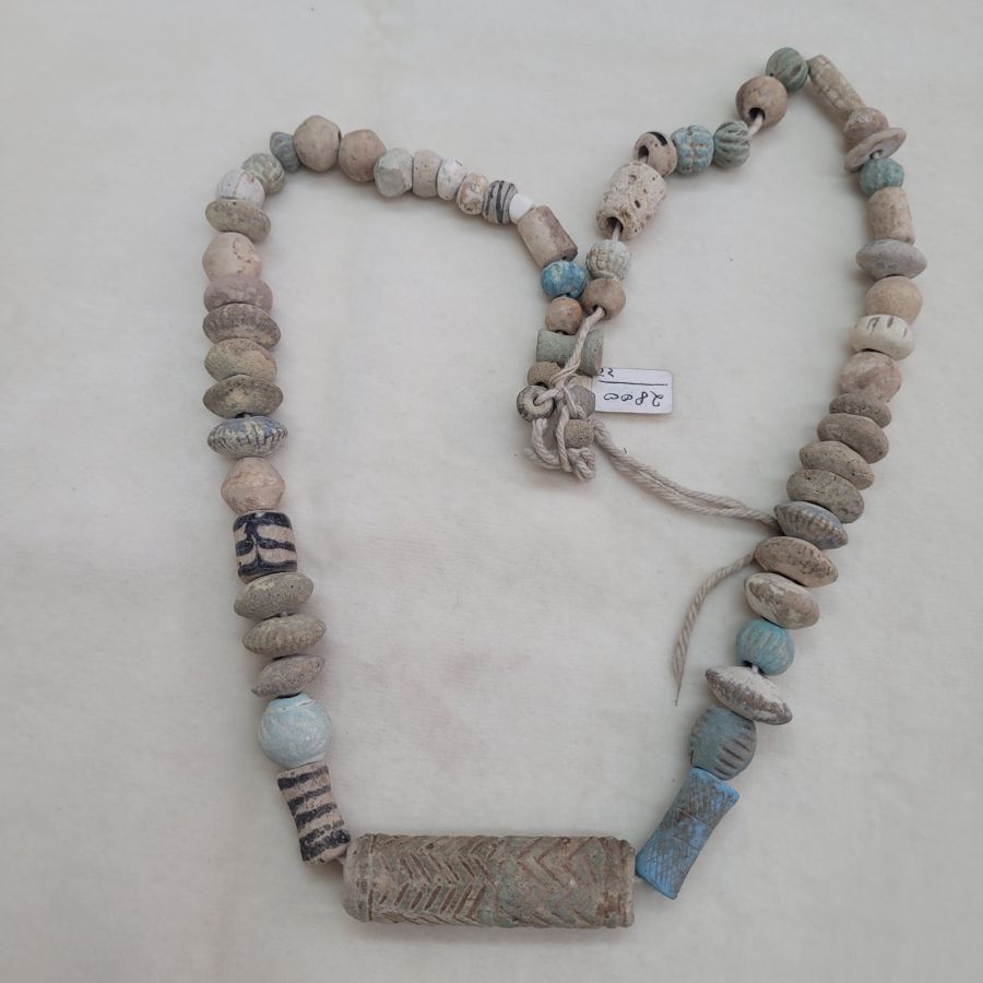 Hand made genuine antique clay beads necklace with different designs of clay colored beads. Dimension 68 cm approximately.