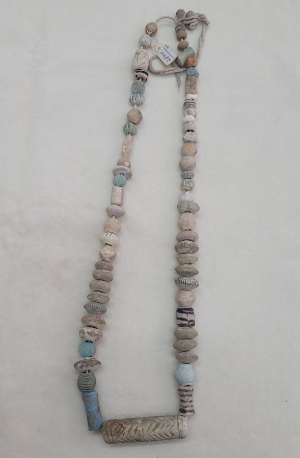 Hand made genuine antique clay beads necklace with different designs of clay colored beads. Dimension 68 cm approximately.