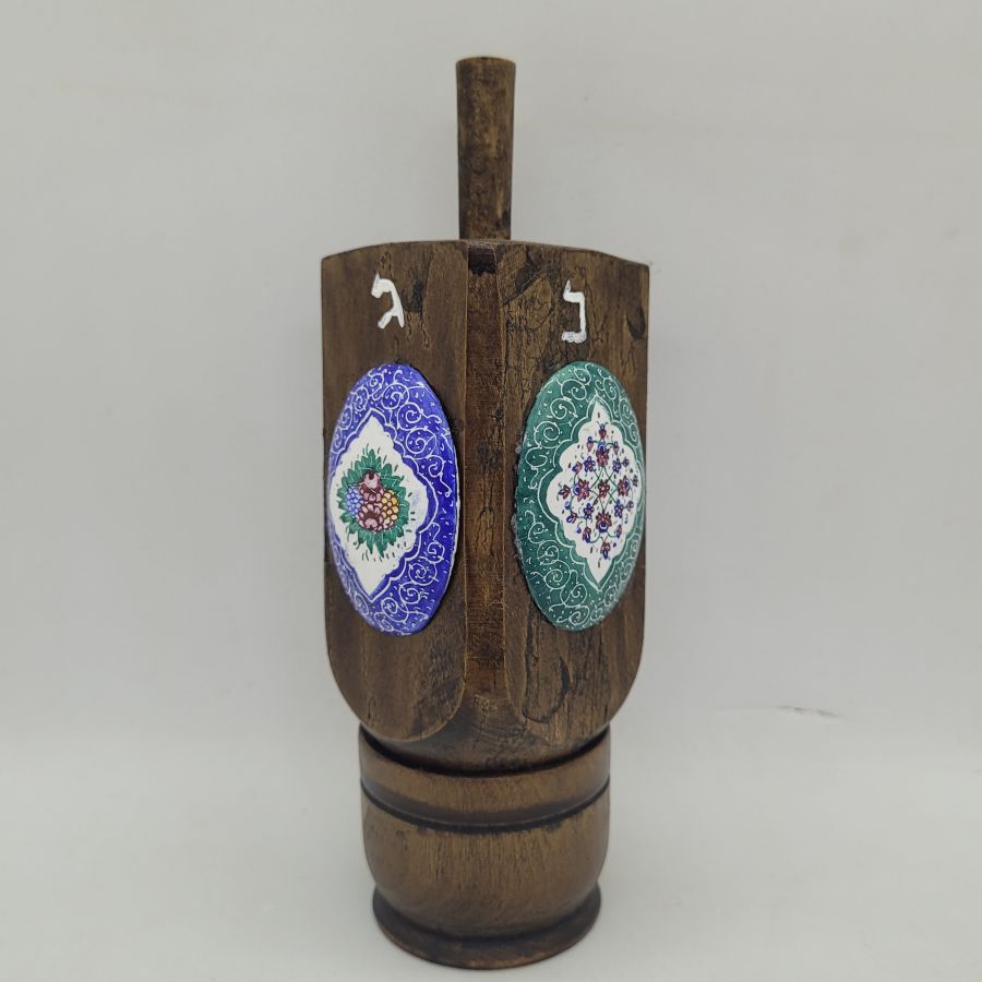 Handmade Hanukah huge Dreidel wood enameled oval floral enameled designs made by S. Ghatan ( Katan). Dimension 5 cm X 5 cm X 13.5 cm approximately.