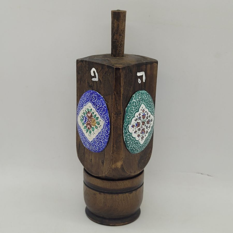 Handmade Hanukah huge Dreidel wood enameled oval floral enameled designs made by S. Ghatan ( Katan). Dimension 5 cm X 5 cm X 13.5 cm approximately.