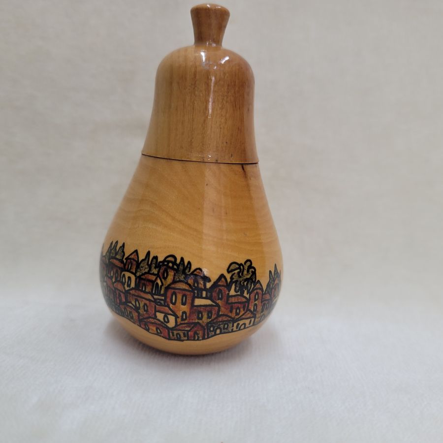 Havdalah olive wood spice box pear shape with Jerusalem houses hand painting designs around. Dimension diameter 5.5 cm X 10.5 cm approximately.