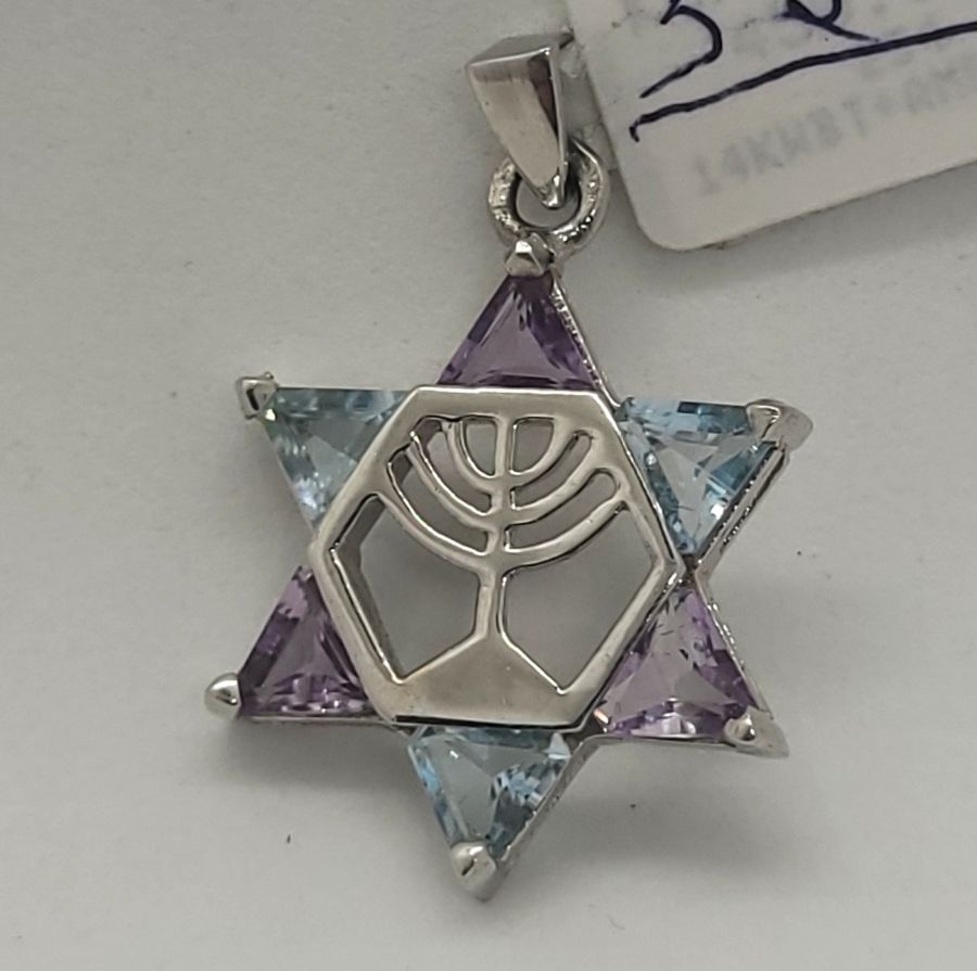 Handmade 14 carat gold 6 Amethyst blue Topaz Magen David star pendant set in and forming a star of David. Dimension 3 cm X 0.4 cm X 2.1 cm approximately.