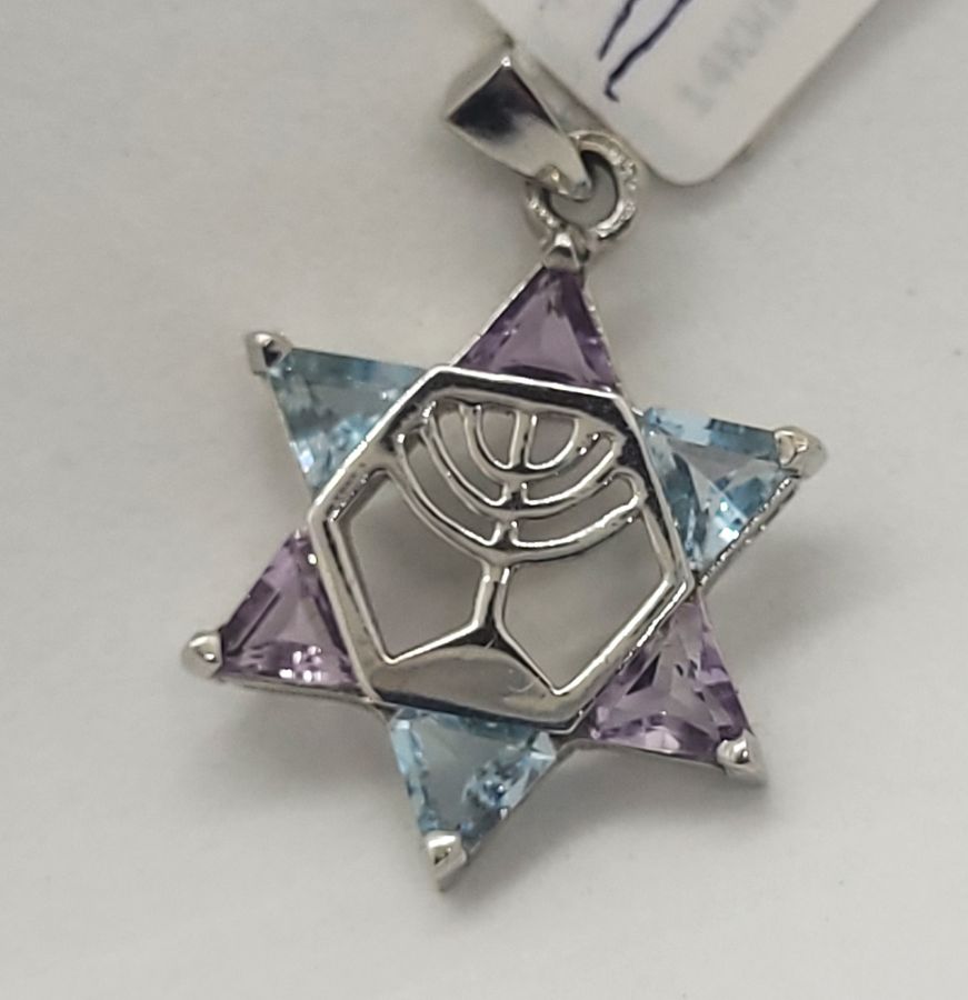 Handmade 14 carat gold 6 Amethyst blue Topaz Magen David star pendant set in and forming a star of David. Dimension 3 cm X 0.4 cm X 2.1 cm approximately.